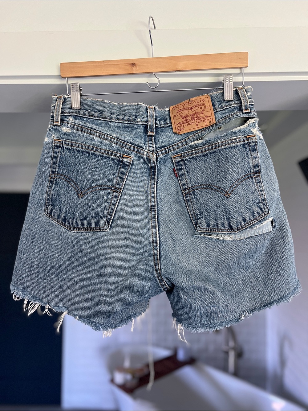 Vintage Levi’s 560 Loose Fit denim Jean shorts ripped holes